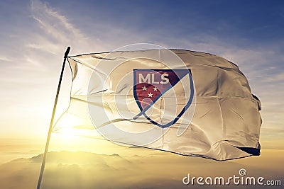 MLS Major League Soccer logo flag textile cloth fabric waving on the top sunrise mist fog Editorial Stock Photo