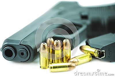 9mm bullets and black gun pistol isolated on white background. Stock Photo