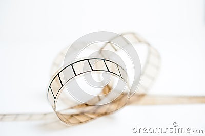 35mm movie film bow closeup on white background Stock Photo