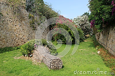 Moat and the fortress walls of the fortifications of the Old Town of Rhodes, Rhodes, Greece Stock Photo