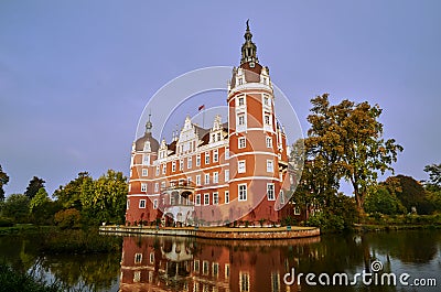 Moat and New Castle in the park Muskauer Stock Photo