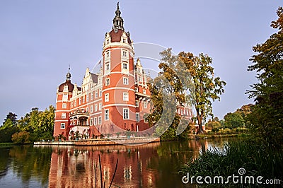 Moat and towers of New Castle in the park Muskauer Stock Photo