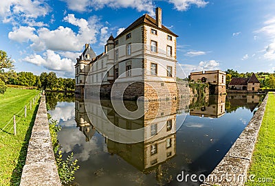 The moated Cormatin castle in South Burgundy Stock Photo