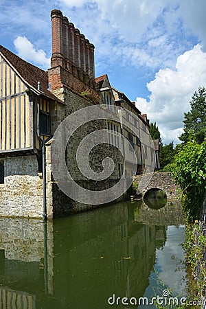 English manor house surrounded by a moat. Ightham, Kent, UK Editorial Stock Photo