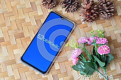 mobikwik on smartphone, popular brand in india Editorial Stock Photo