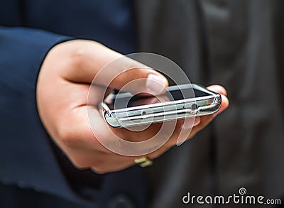 Mobil phone in the hand Stock Photo