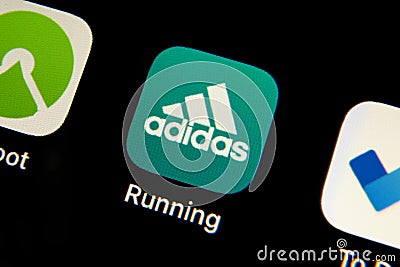 Mobile Adidas Running app icon isolated on black iPhone screen. Editorial Stock Photo