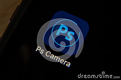 Mobile Adobe Ps camera app icon isolated on black iPhone screen. Editorial Stock Photo