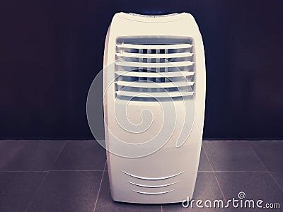 Mobile air conditioner on dark background Stock Photo