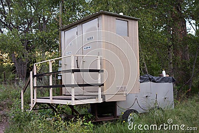 A mobile bio toilet in the wilderness Stock Photo