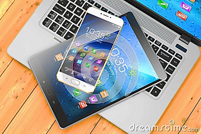 Mobile devices. Laptop, smartphone, pad on wooden table Stock Photo