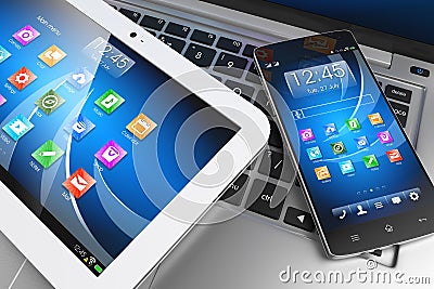 Mobile devices. Tablet PC, smartphone on laptop, technology conc Stock Photo