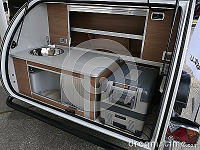 Mobile kitchen in trunk of light modern turkish trailer camper van Caretta 1500 Editorial Stock Photo