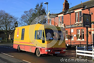Mobile Library Van outside a Village Pub. Editorial Stock Photo