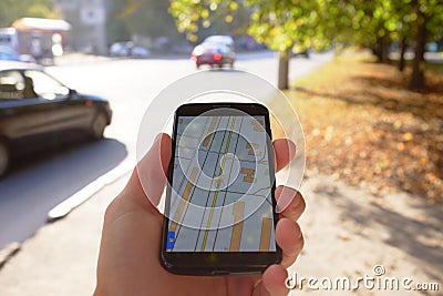 Mobile navigation on street Stock Photo