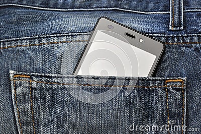 Mobile phone, cellphone in back pocket blue jeans Stock Photo