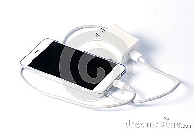 Mobile phone and charger cable Stock Photo