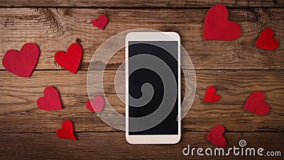 Mobile phone with hearts romantic wallpaper Stock Photo