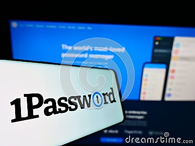 Mobile phone with logo of password manager company AgileBits Inc. (1Password) on screen in front of website. Editorial Stock Photo