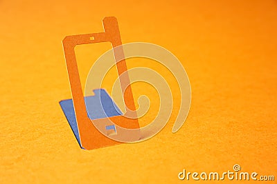 Mobile phone paper symbol Stock Photo