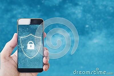 Mobile phone safety and internet online security system. Hand using mobile smart phone with lock icon on screen Stock Photo