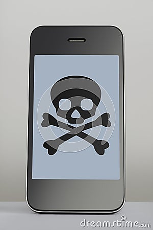 Mobile phone with skull and crossbones on the screen Stock Photo