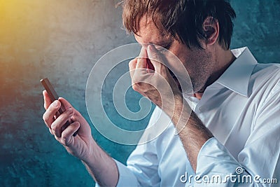 Mobile phone and technology addiction Stock Photo