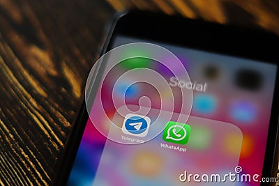 Mobile phone with Telegram and WhatsApp Messengers on phone screen. Los Angeles, California, USA - 13 October 2019 Editorial Stock Photo