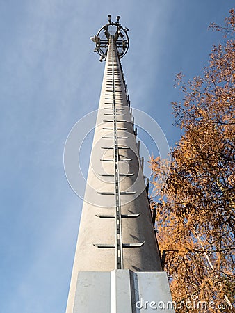 Mobile phone tower with service ladder Stock Photo