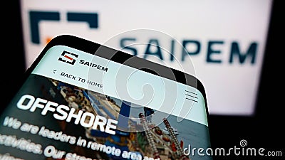 Mobile phone with website of Italian oilfield services company Saipem S.p.A. on screen in front of logo. Editorial Stock Photo