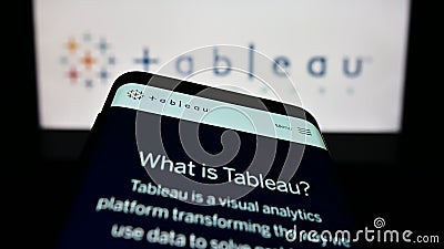 Mobile phone with website of US company Tableau Software Inc. on screen in front of business logo. Editorial Stock Photo