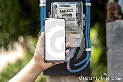 Mobile phones with white screens, including electricity meters for household electrical appliances, electricity usage concepts. Stock Photo