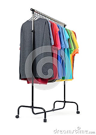 Mobile rack with color clothes on white background. File contains a path to isolation. Stock Photo