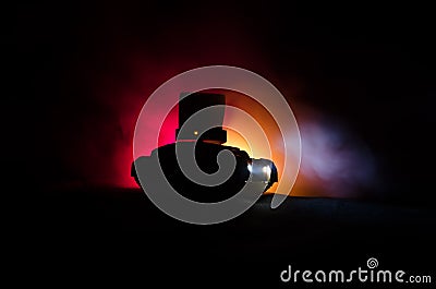 Mobile rocket launch with fire clouds on a dark background. Gloomy Sky at night. Balistic Rockets Stock Photo