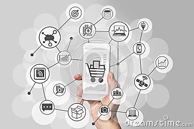 Mobile shopping experience with hand holding smartphone to connect to online shops to purchase consumer goods Stock Photo