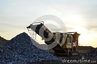 Mobile Stone Jaw crusher machine for crushing concrete into gravel and subsequent cement production. Salvaging and recycling of Stock Photo