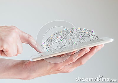 Mobile tablet in male hands with finger pointing at display. Concept of computer networks and social networks Stock Photo