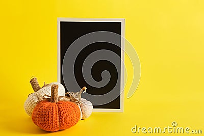 mocap black sign and halloween decor on a bright yellow background Stock Photo