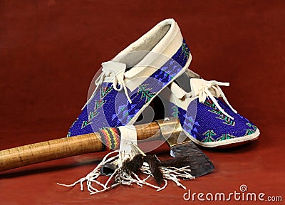 Moccasins and Tomahawk Stock Photo