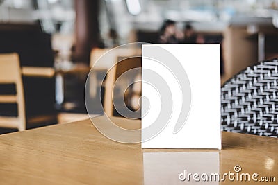 Mock up acrylic frame posters pattern template forms background, blank menu frame on table in coffee shop stand for your text of Stock Photo