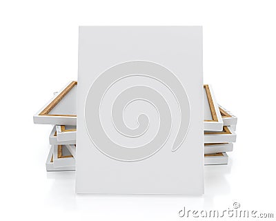 Mock up blank canvas or poster with pile of canvas on floor and wall, background Stock Photo
