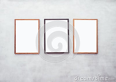 Mock up Blank Posters with Wooden frame on Cement wall Stock Photo