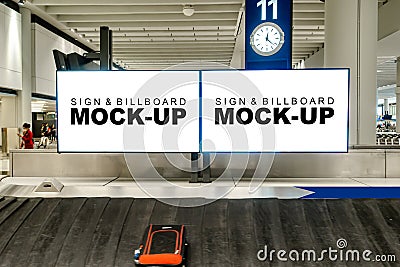 Mock up large blank horizontal billboard at baggage claim point Stock Photo