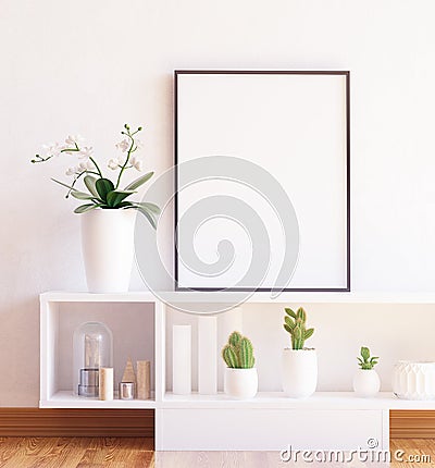 Mock up poster frame close-up on shelf with flowers Stock Photo