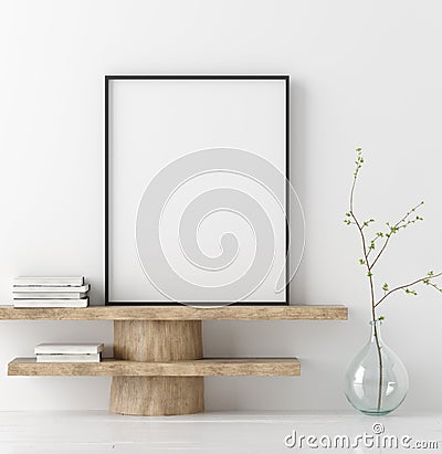 Mock up poster on wooden bench with branch in vase Stock Photo