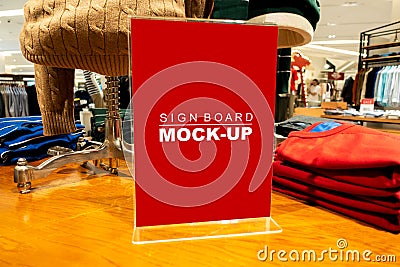 Mock up signboard advertising in acrylic at fashion store Stock Photo