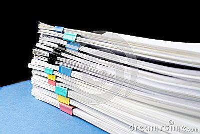 Mock up, stack of papers documents in archives files with paper clips on desk at offices, business concept. Copy space Stock Photo