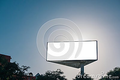 Mock up of triangle billboard or advertising poster with blue sky background Stock Photo