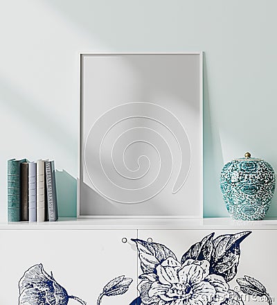 Mock up white blank poster frame in modern orient style interior with light blue wall, books and porcelain vase, japaneese style, Stock Photo