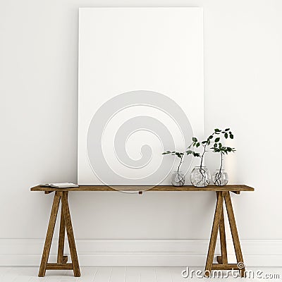 Mock up of a white canvas on a wooden table in a bright interior Stock Photo